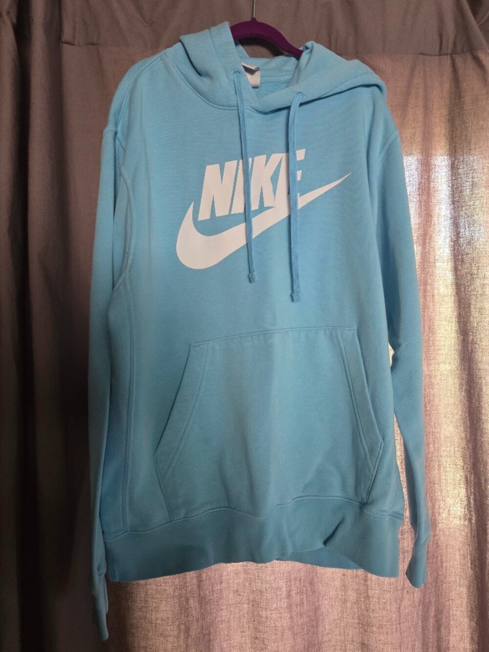 Nike Hoodie, light blue with white swoosh, size small